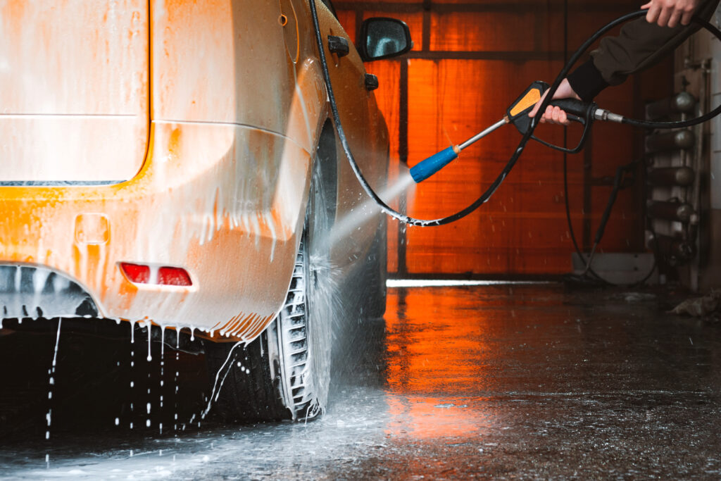 washing yellow car contactless selfservice car wash washing sedan car with foam highpressure water